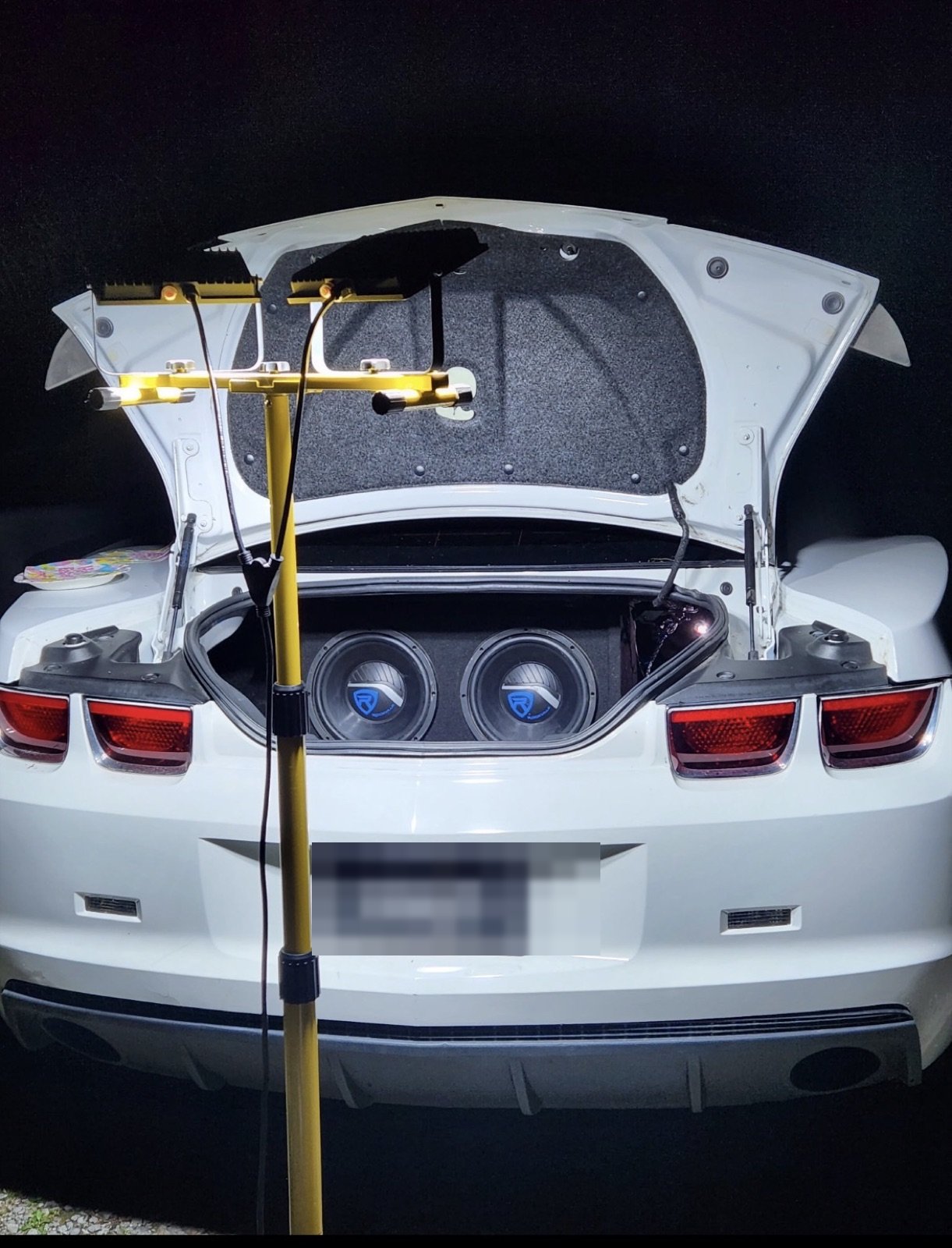 Dual subwoofers installed in a Chevrolet Camaro trunk